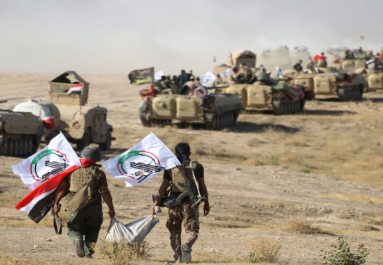حرب بيانات بين الحشد الشعبي والدولة: مَن الأعلى كعباً في العراق؟