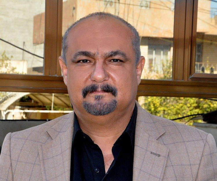 الصحفي العراقي الكردي محمد حسين أحمد 